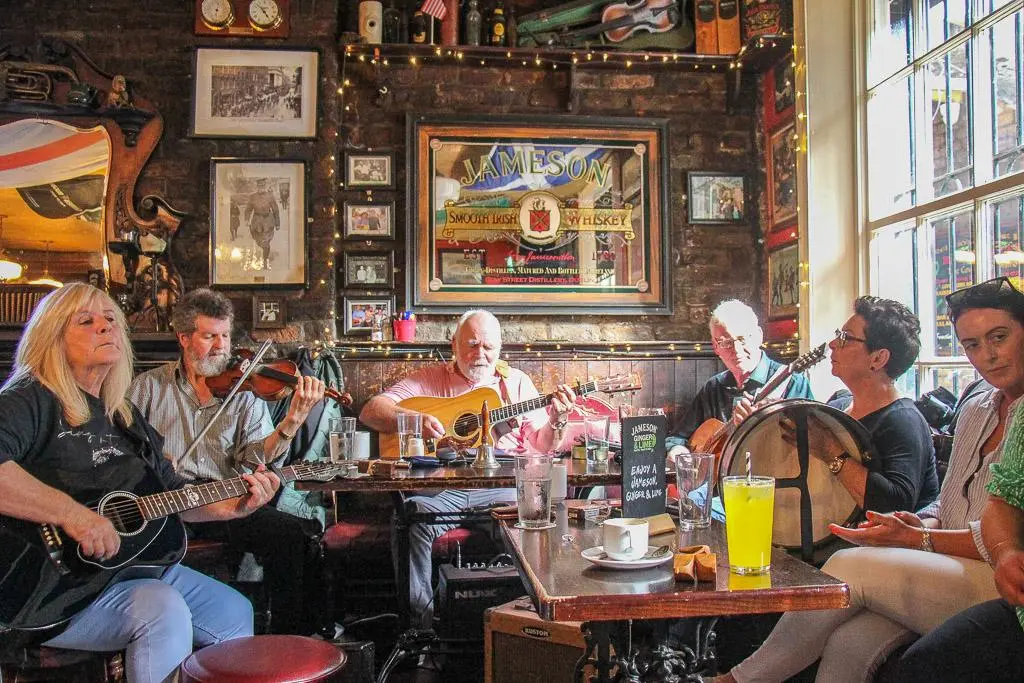 Enjoy a pint and traditional Irish food on a rainy day in Slattery's pub.