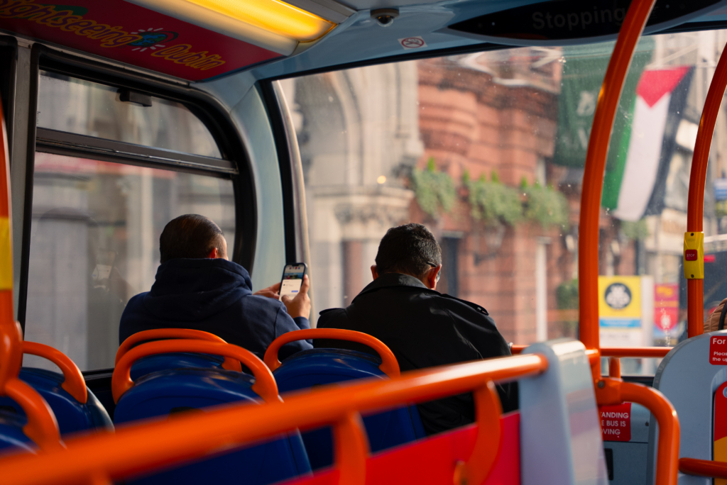 two men inside the dublin city sight seeing bus