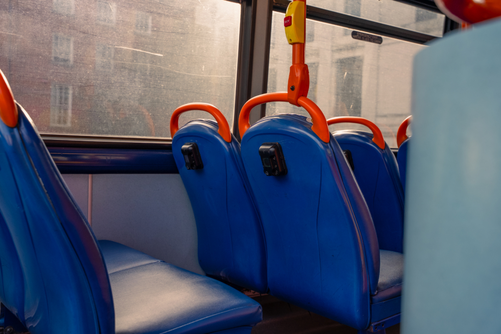 blue seats inside dublin city sight seeing bus